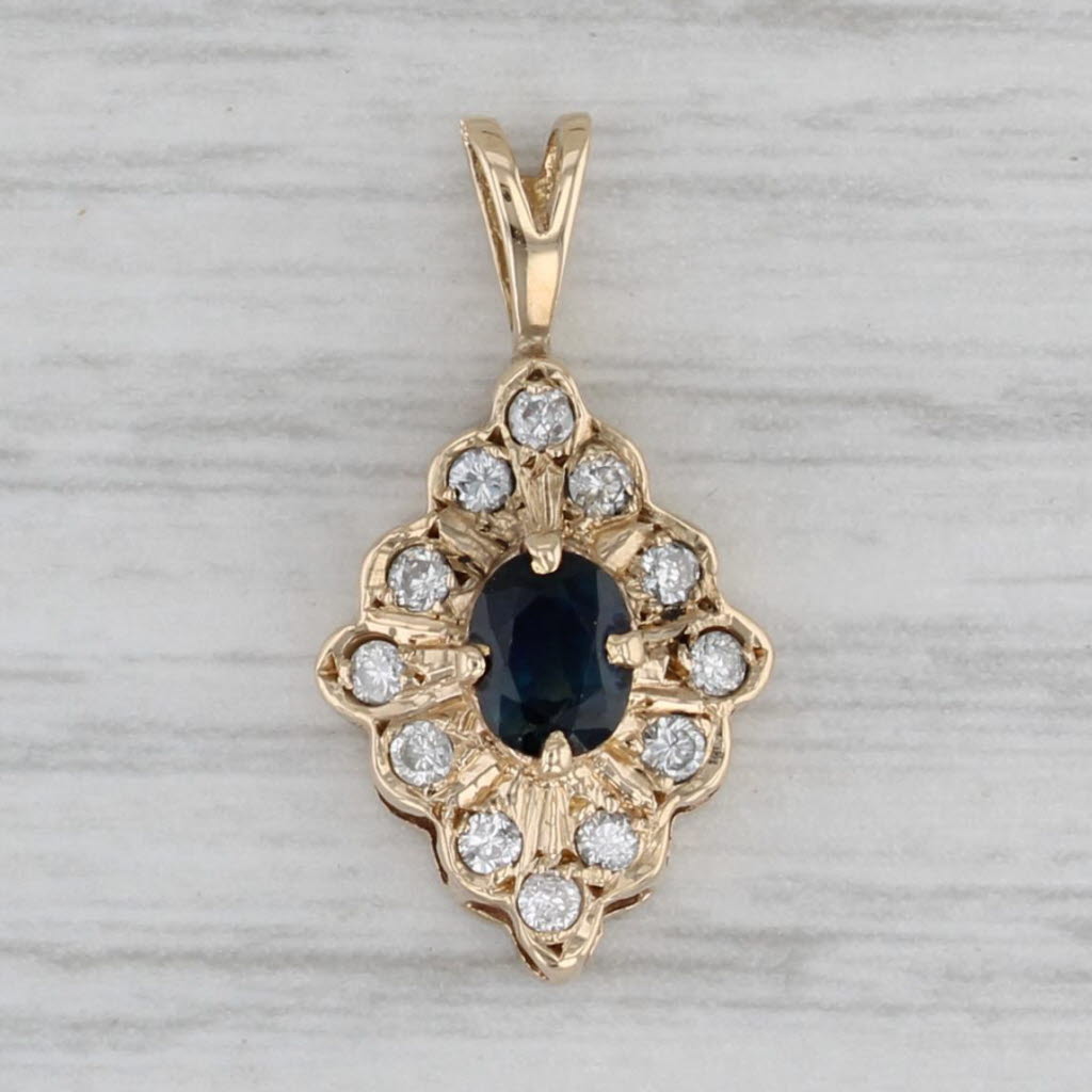 Gray 0.48ctw Oval Blue Sapphire Diamond Halo Pendant 14k Yellow Gold