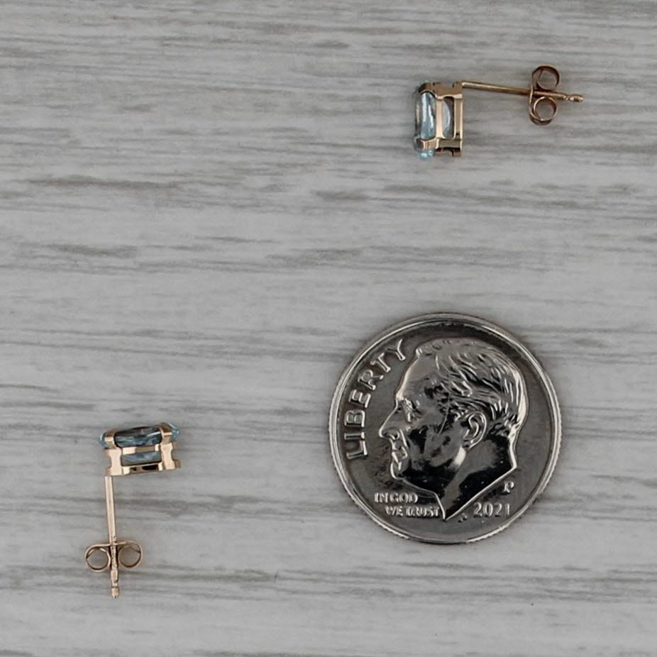 1.18ctw Oval Blue Topaz Stud Earrings 10k Yellow Gold Solitaire Studs