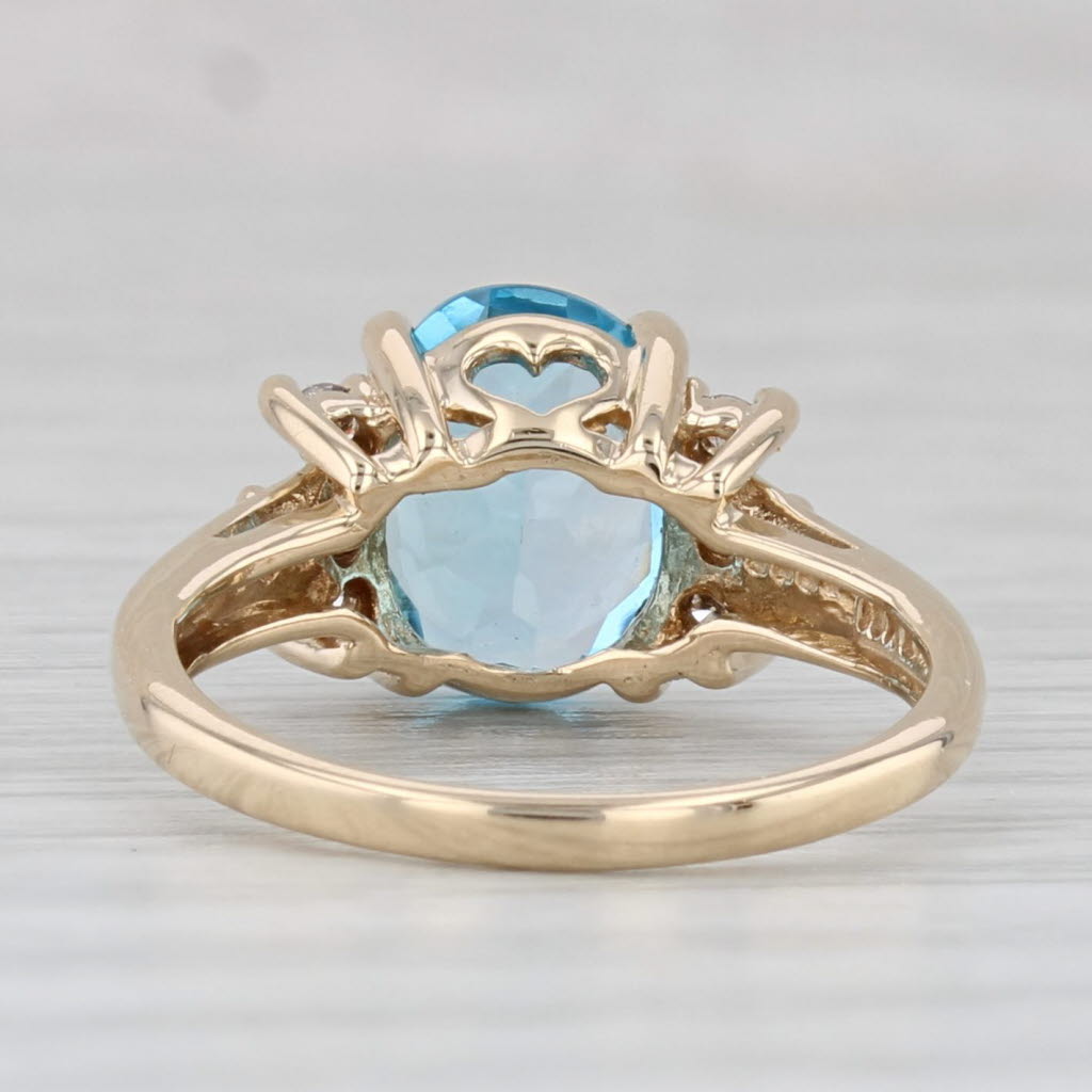 Light Gray 2.19ctw Oval Blue Topaz Diamond Ring 10k Yellow Gold Size 4.5