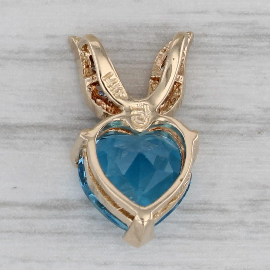 Gray 2.38ctw Blue Topaz Heart Diamond Pendant 14k Yellow Gold