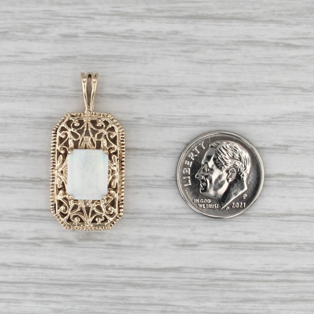 Ornate Openwork Opal Cabochon Pendant 10k Yellow Gold