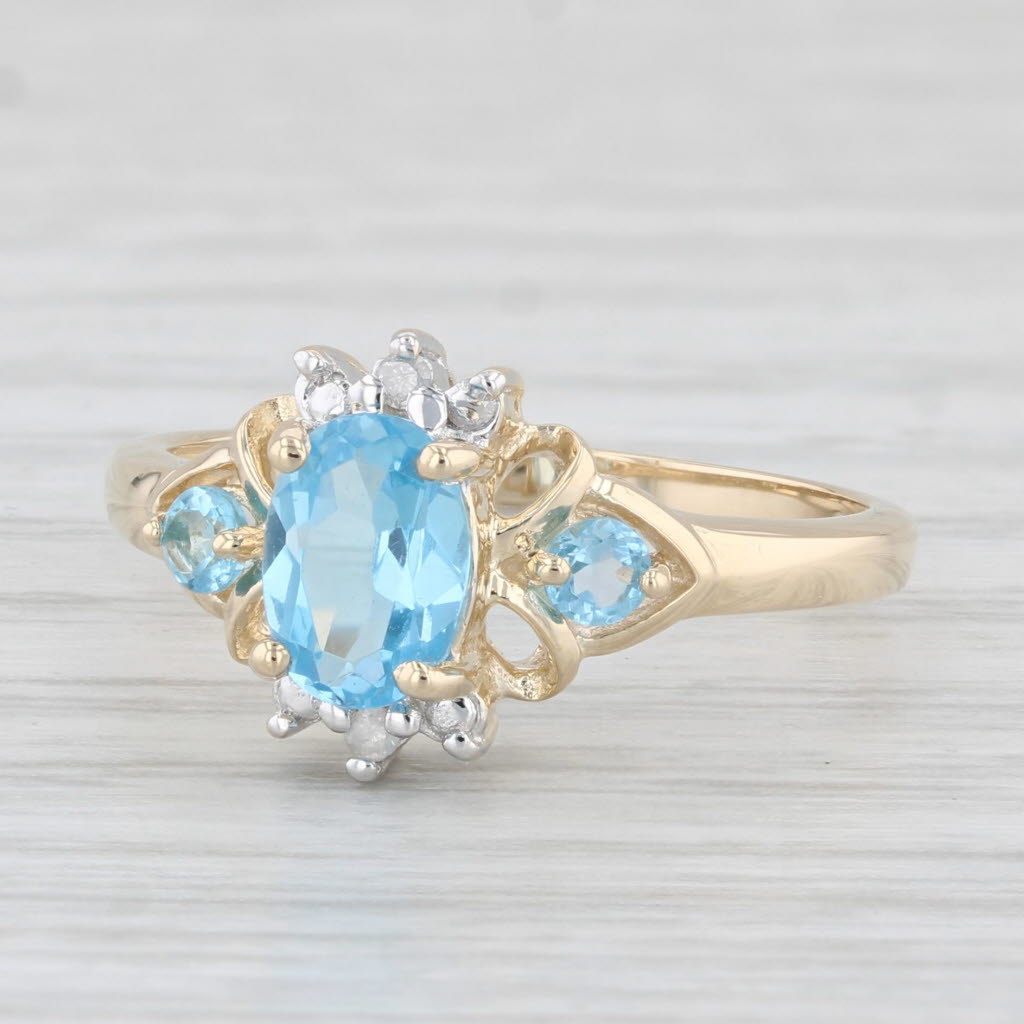 Light Gray 1.02ctw Oval Blue Topaz Diamond Ring 14k Yellow Gold Size 7