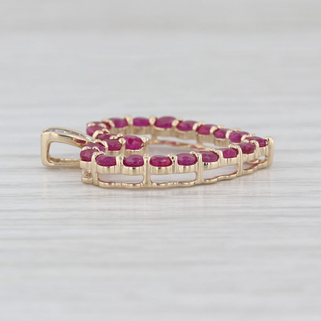 1.65ctw Ruby Diamond Open Heart Pendant 14k Yellow Gold