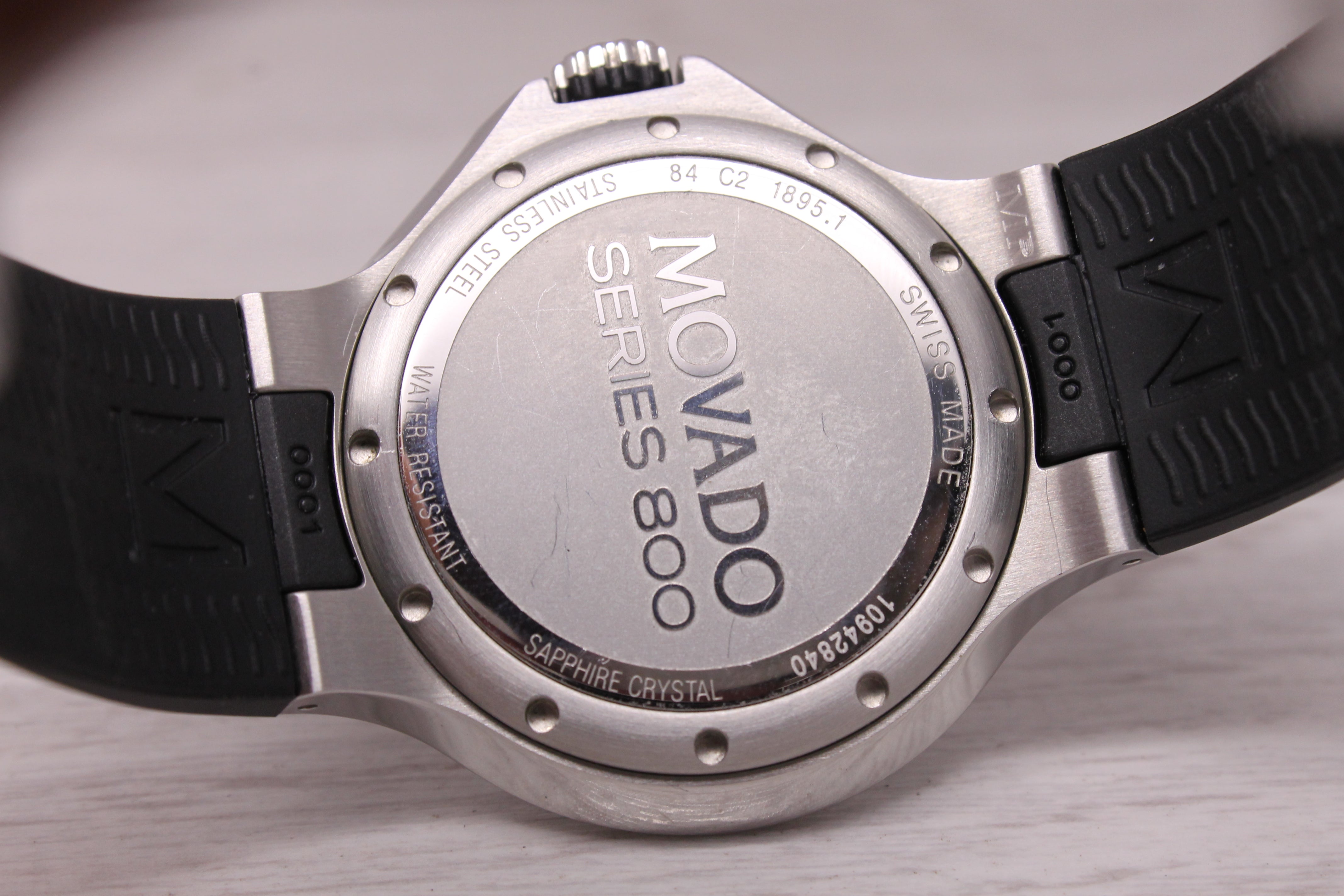 Movado Series 800 43mm Stainless Steel Quartz Watch Swiss Red Dial Date