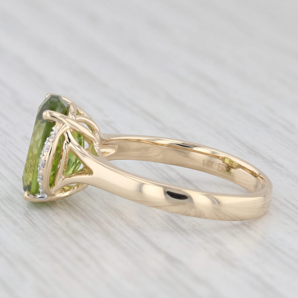 Light Gray 4.03ctw Oval Peridot Diamond Ring 14k Yellow Gold Size 7