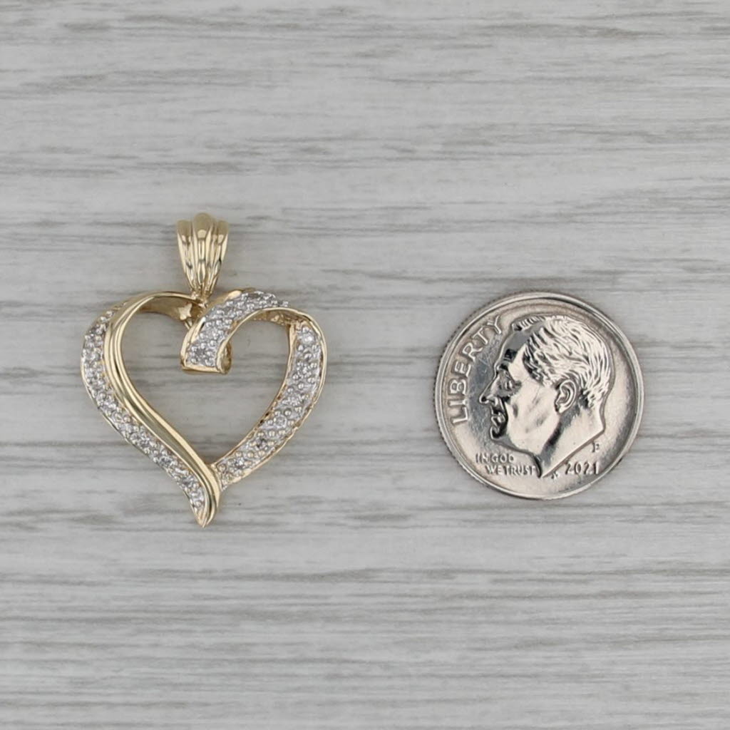 0.14ctw Diamond Accented Open Heart Pendant 10k Yellow White Gold