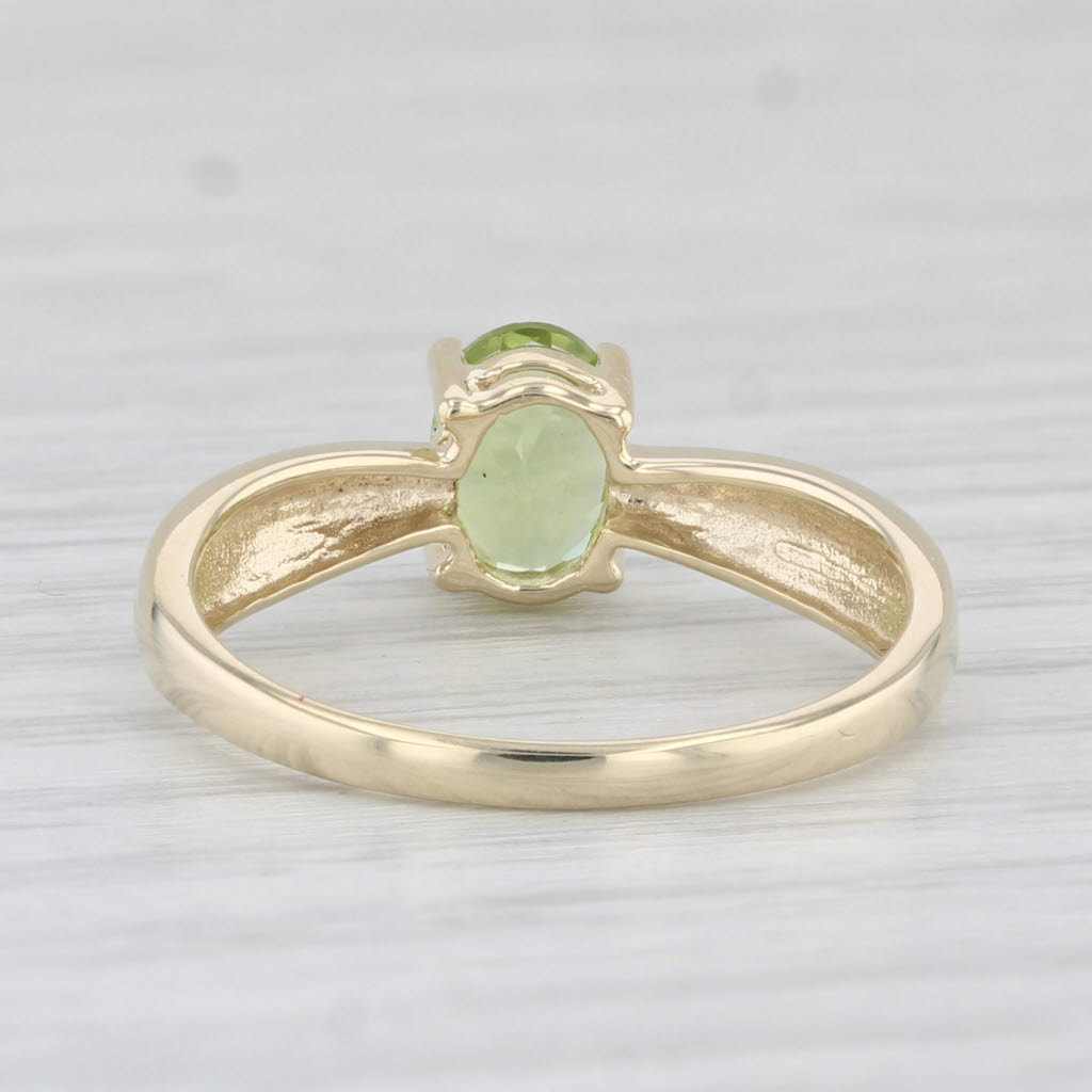 Light Gray 0.80ct Oval Peridot Solitaire Ring 10k Yellow Gold Size 7.25