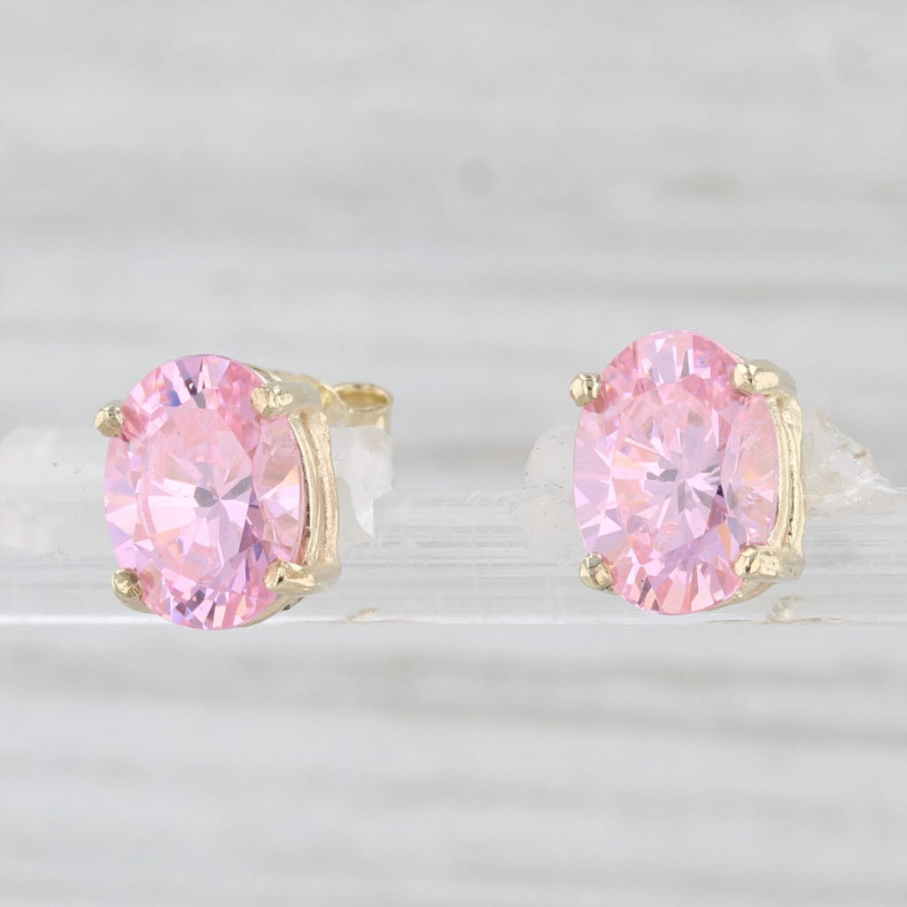 Light Gray 2.40ctw Oval Pink Ice Cubic Zirconia Stud Earrings 10k Yellow Gold