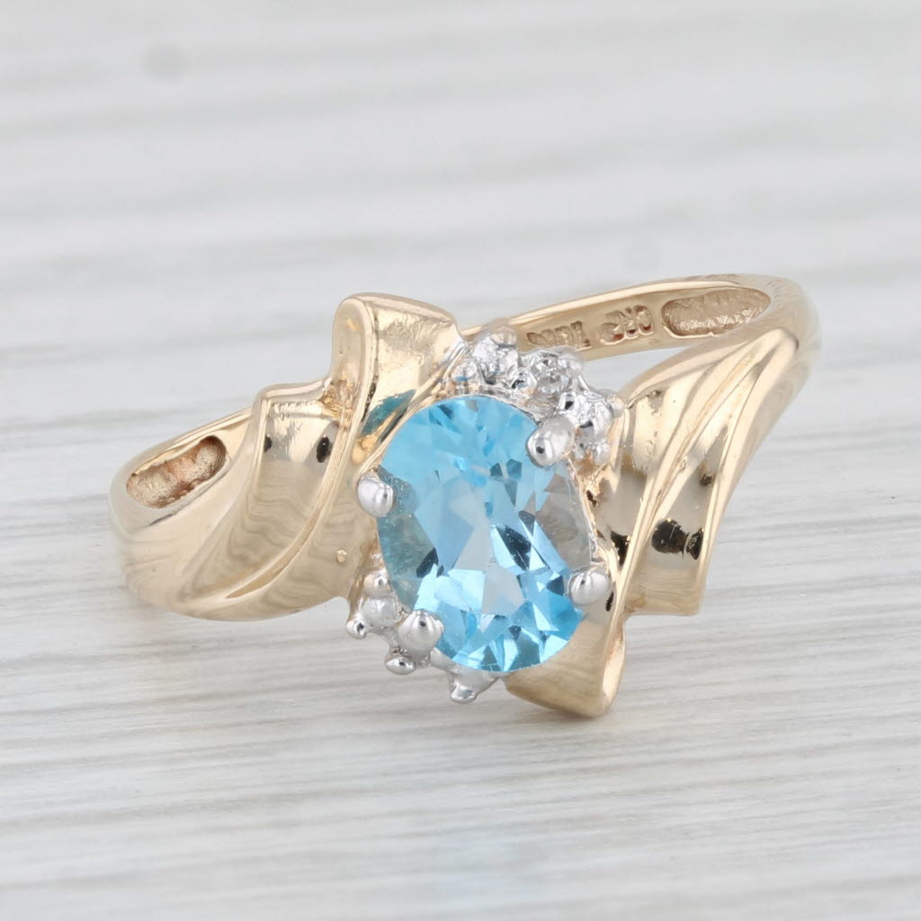 Light Gray 1ctw Oval Blue Topaz Diamond Ring 10k Yellow Gold Size 7.25