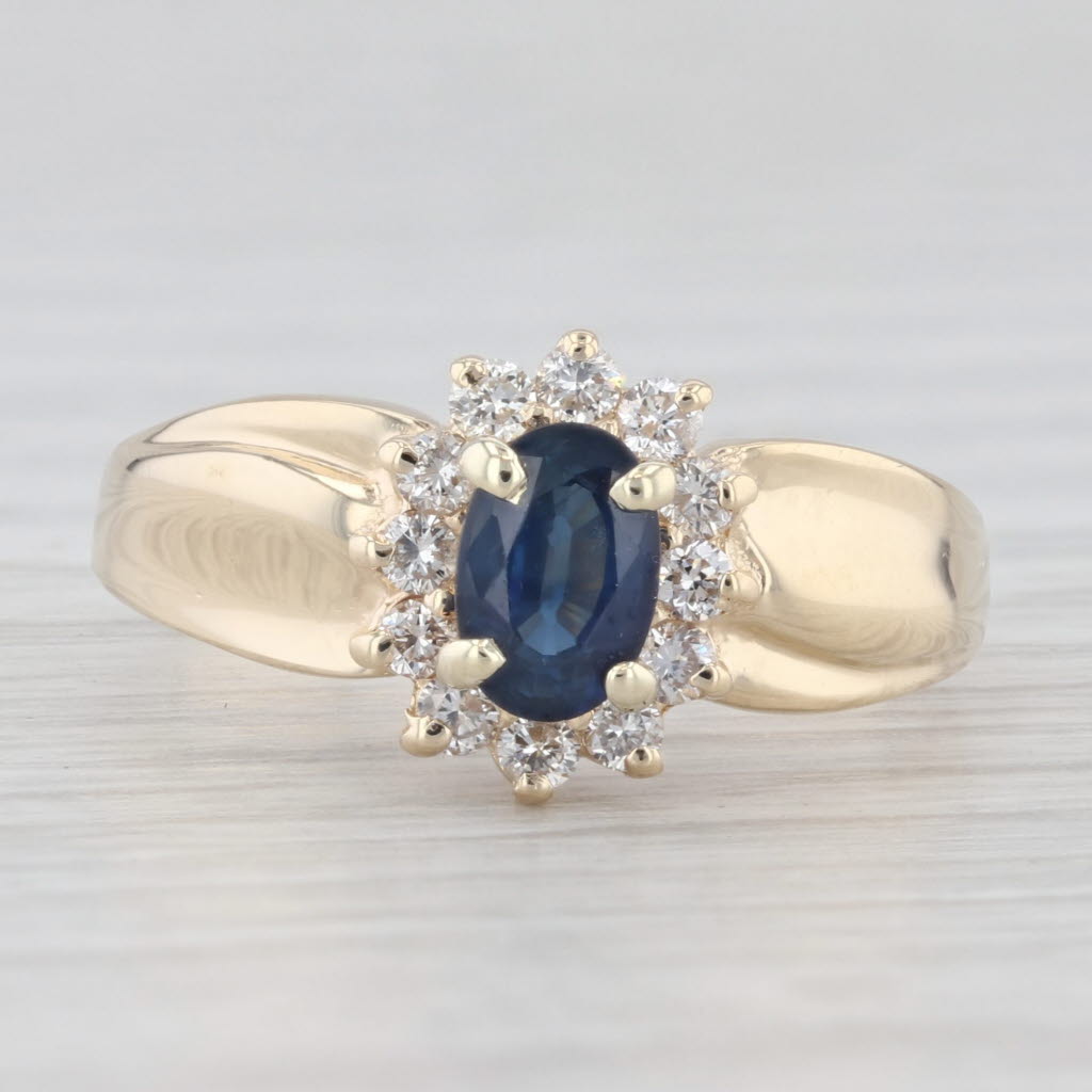 Light Gray 0.90ctw Sapphire Oval Diamond Halo 14k Yellow Gold Ring Size 6.5