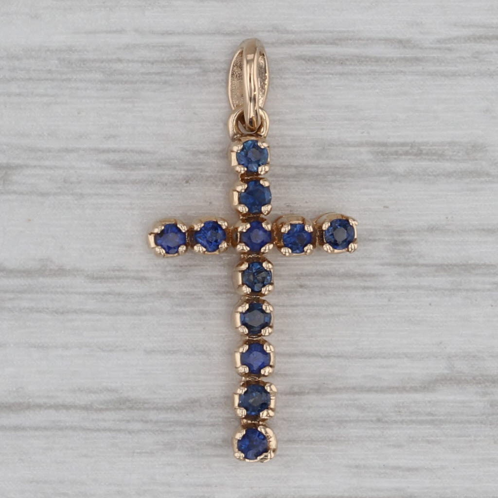 Gray 0.30ctw Blue Sapphire Cross Pendant 14k Yellow Gold