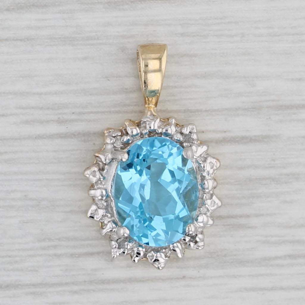 Gray 2.25ct Oval Blue Topaz Pendant 10k Yellow Gold Diamond Accents