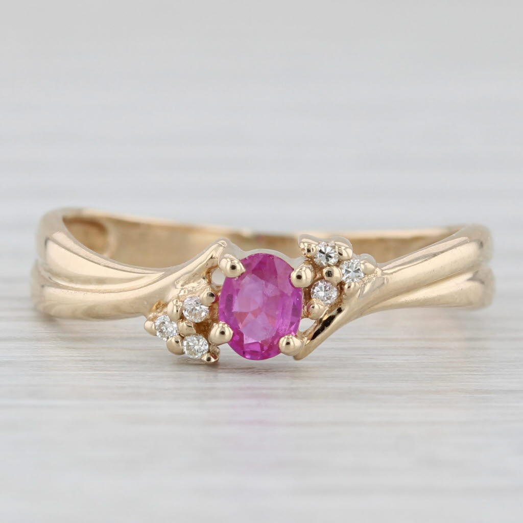 Light Gray 0.28ctw Oval Pink Sapphire Cubic Zirconia Ring 14k Yellow Gold Size 4.75