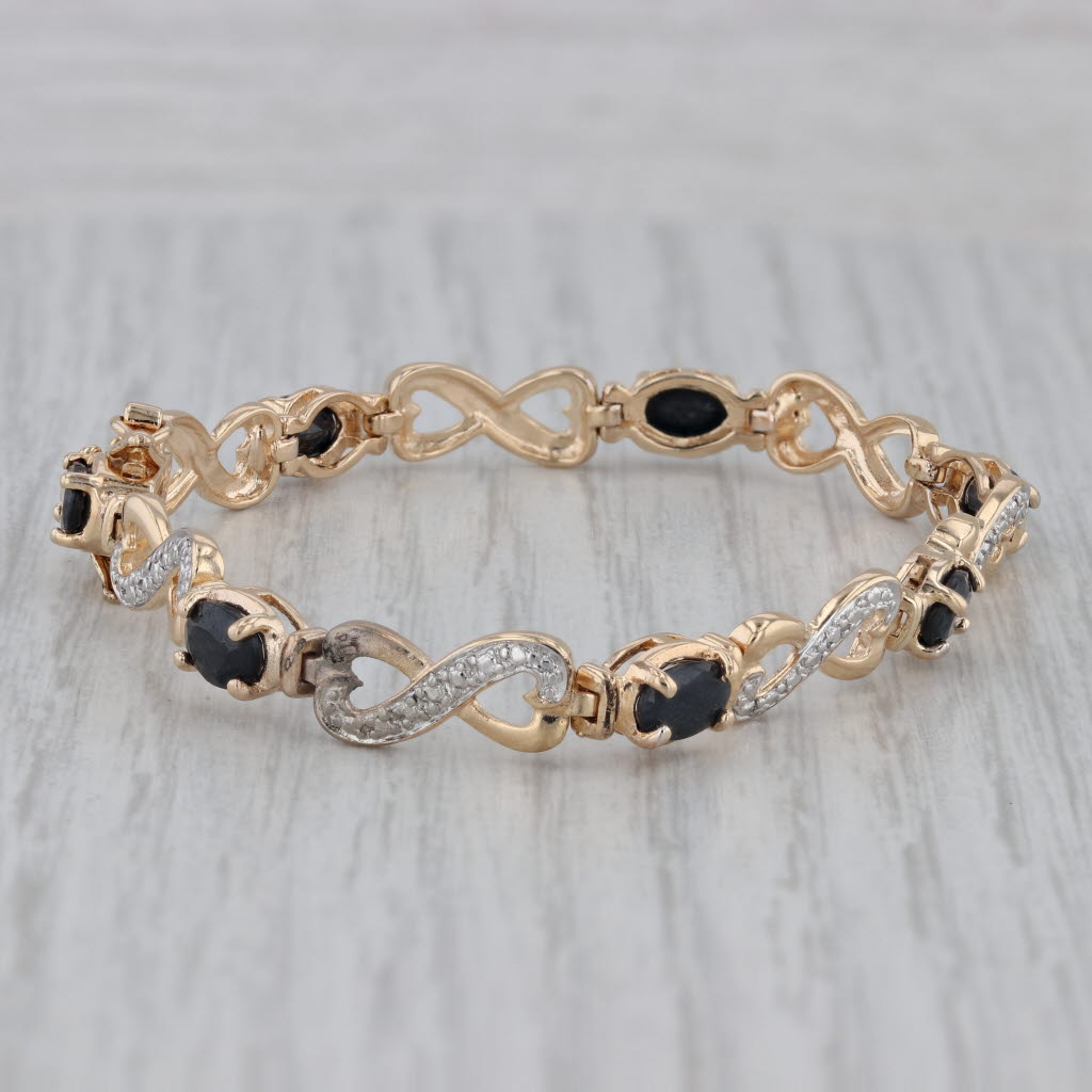 Gray 4.80ctw Blue Sapphire Bracelet Sterling Silver Gold Plated Diamond Accents 6.25"