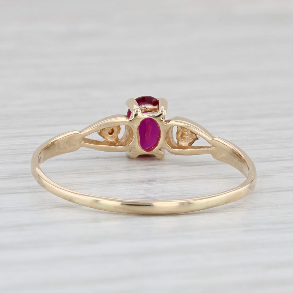 Light Gray 0.50ctw Oval Lab Created Ruby Ring 10k Yellow Gold Size 10.75