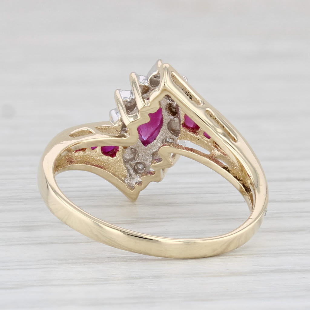 Light Gray 0.48ctw Marquise Ruby Halo Bypass Ring 10k Yellow Gold Size 6