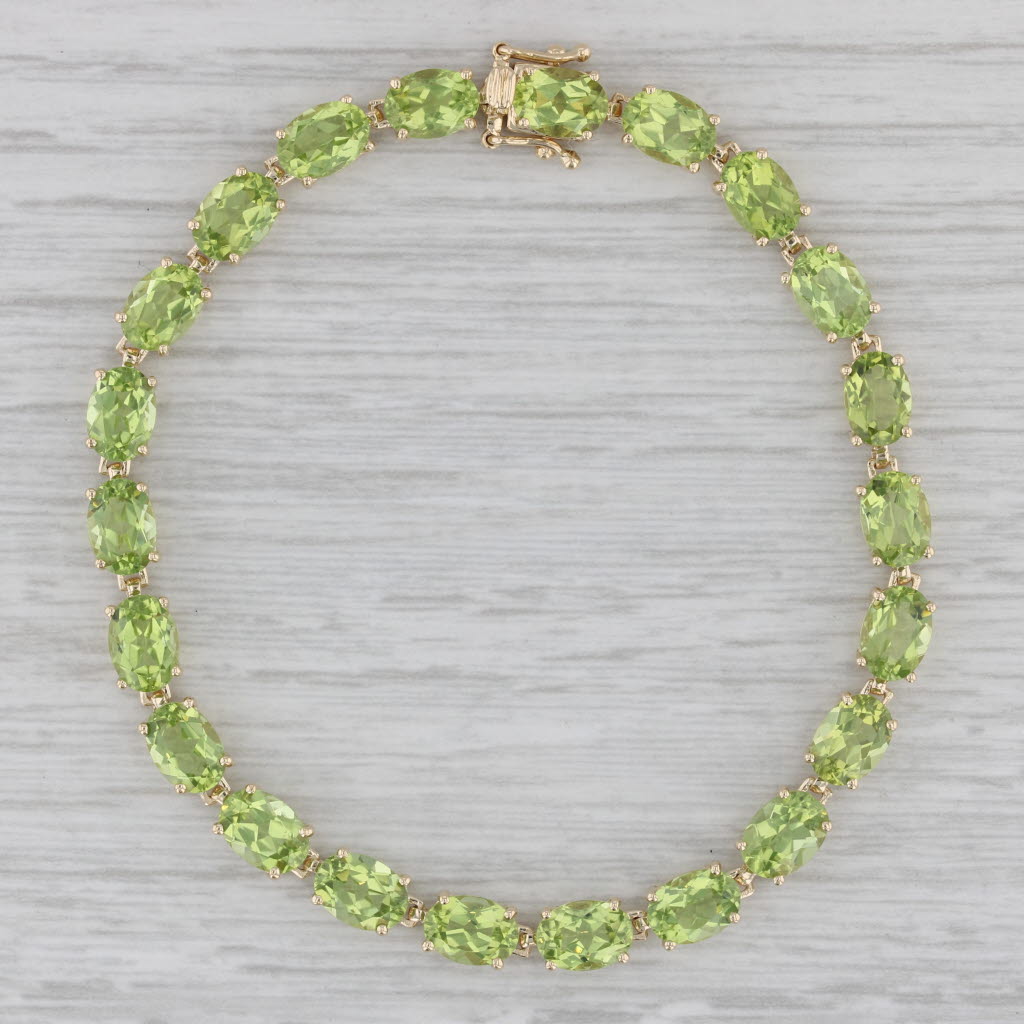 Gray 17.50ctw Peridot Tennis Bracelet 14k Yellow Gold 7.25" 5mm