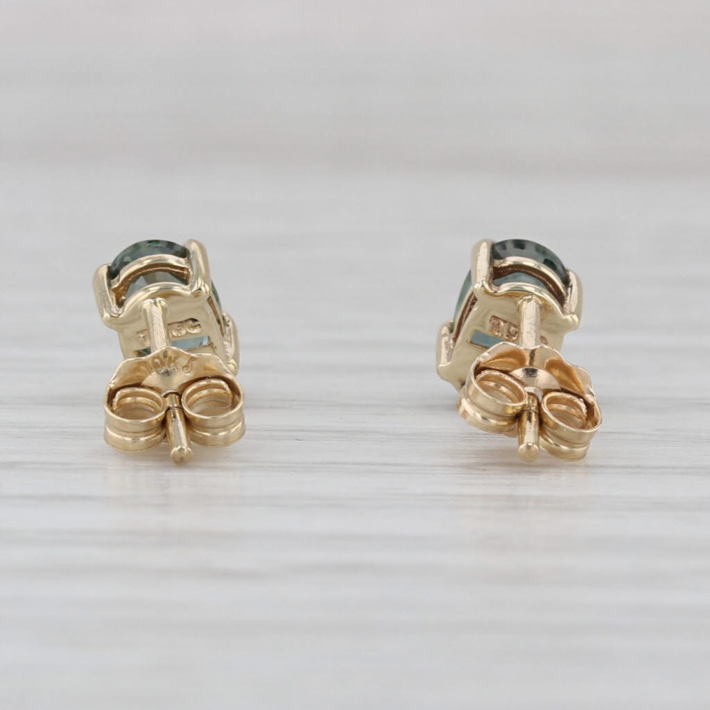 1.30ctw Color Change Sapphire Stud Earrings 10k Yellow Gold Oval Solitaire Studs