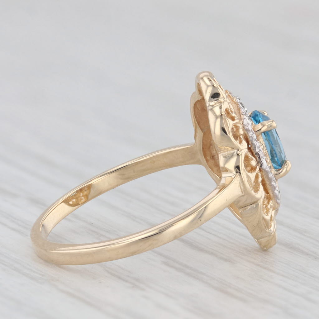 Light Gray 0.60ct Oval Blue Topaz Ring 10k Yellow Gold Size 6 Diamond Accents