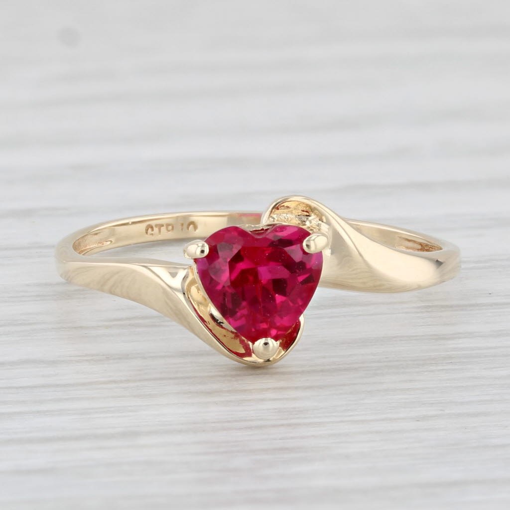 Light Gray 0.70ct Lab Created Ruby Heart Ring 10k Yellow Gold Bypass Size 8