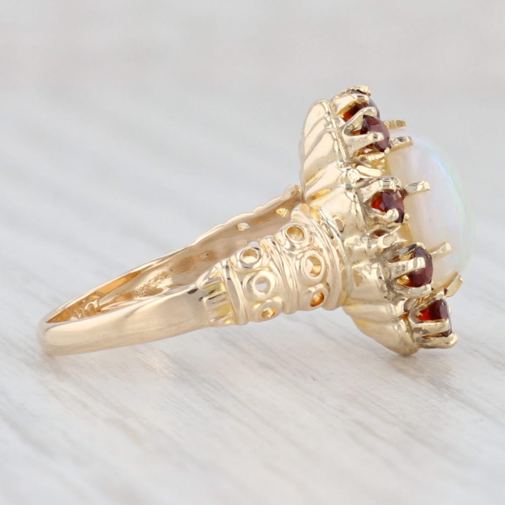 Light Gray 0.80ctw Garnet Halo Opal Ring 10k Yellow Gold Size 6