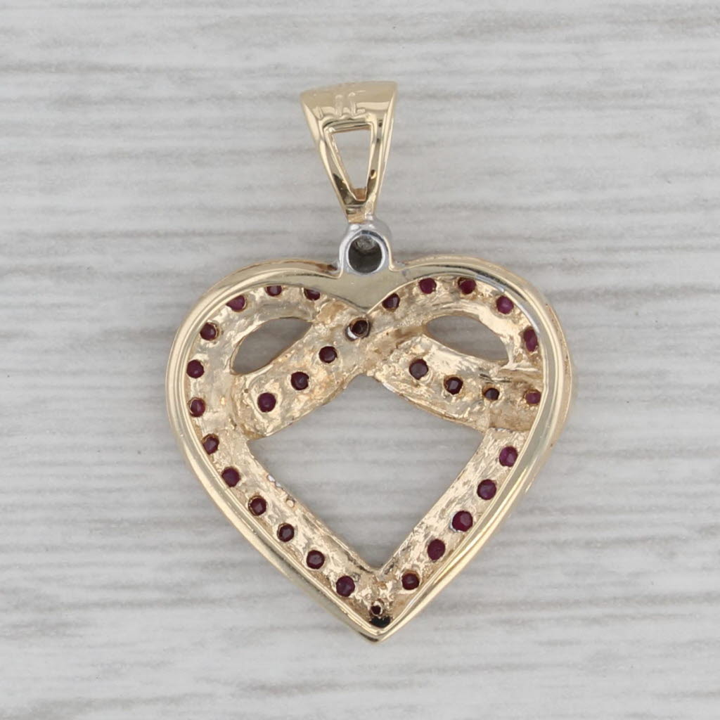 Gray 0.44ctw Ruby Diamond Knotted Heart Pendant 10k Yellow Gold