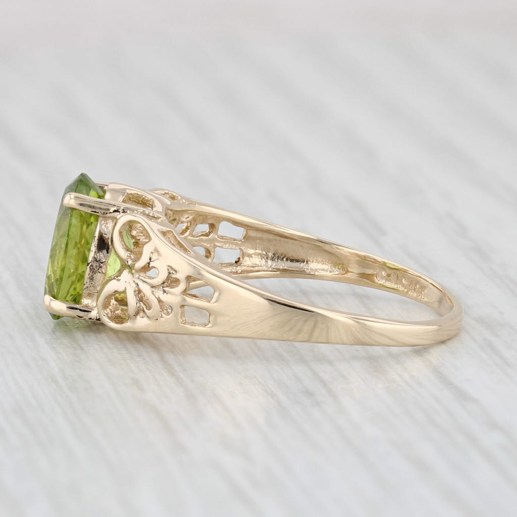 Light Gray 2.15ct Oval Peridot Solitaire Ring 10k Yellow Gold Size 8