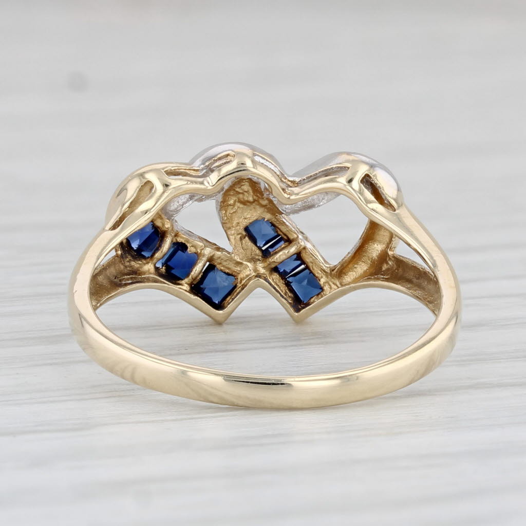 Light Gray 0.33ctw Blue Sapphire Diamond Interlocking Hearts Ring 10k Yellow Gold Size 7