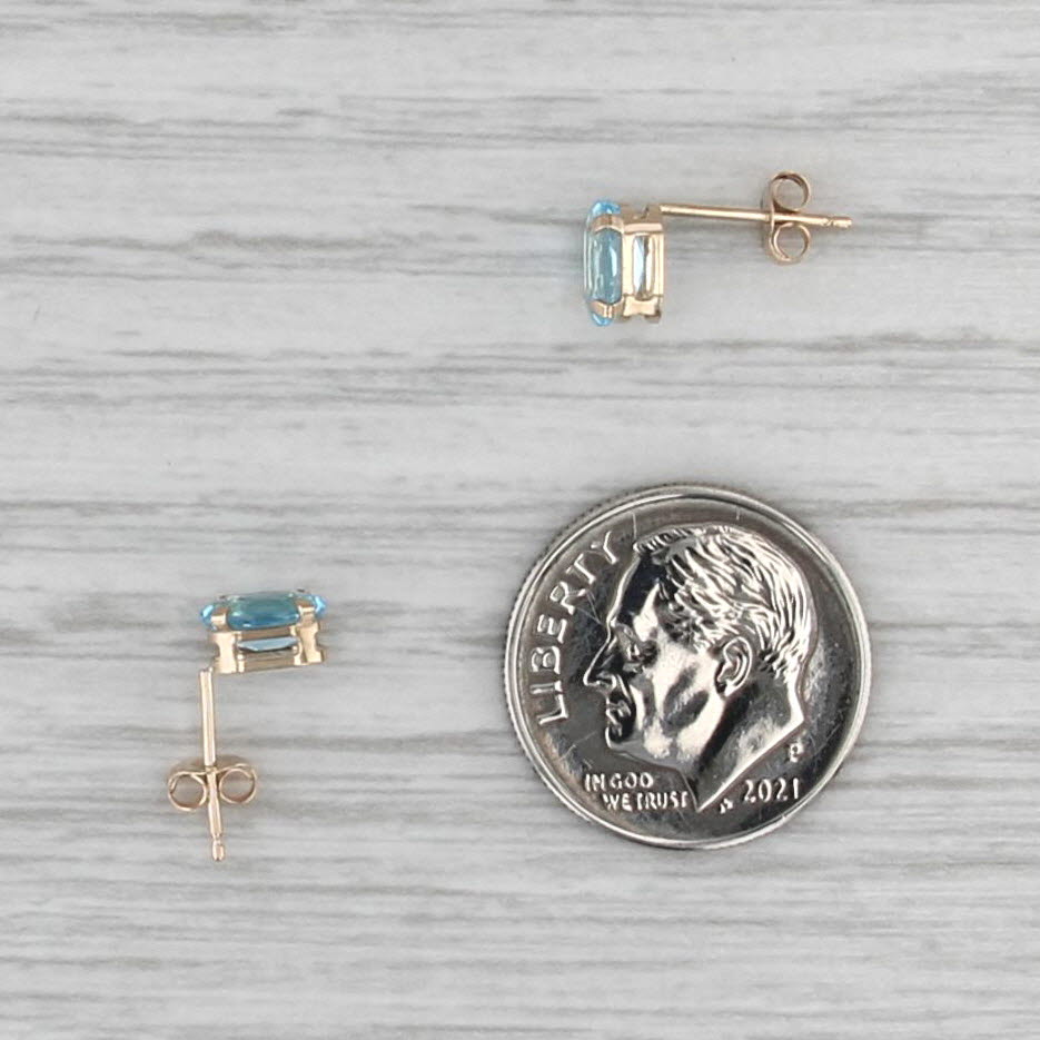 1.10ctw Oval Blue Topaz Stud Earrings 10k Yellow Gold Solitaire Studs