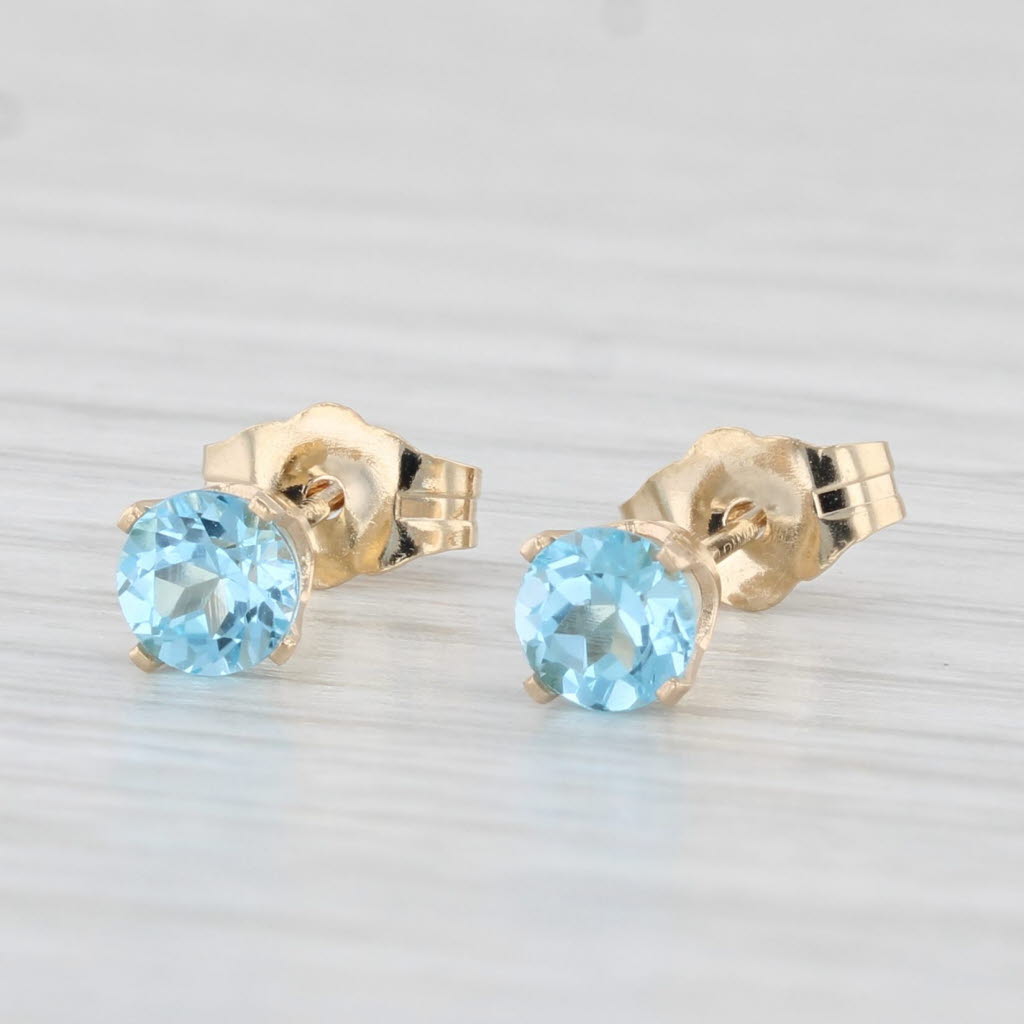 Light Gray 0.60ctw Blue Topaz Round Solitaire Stud Earrings 14k Yellow Gold