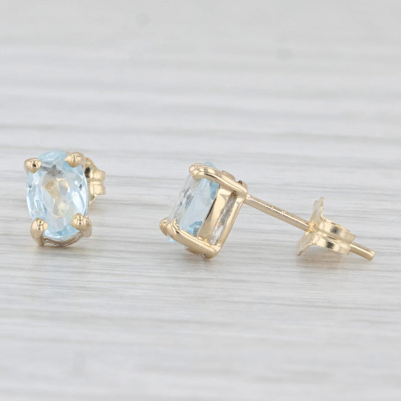 0.80ctw Aquamarine Stud Earrings 14k Yellow Gold Oval Solitaires