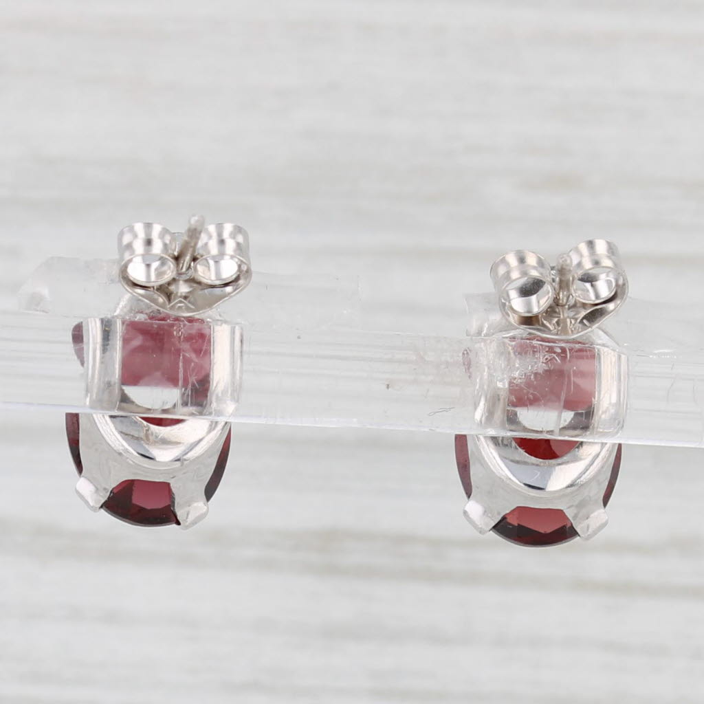 Light Gray 4.20ctw Garnet Oval Solitaire Stud Earrings 14k White Gold