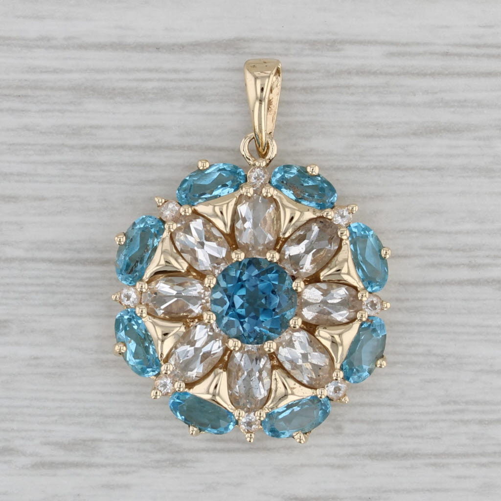 Gray 6ctw Blue White Topaz Flower Pendant 14k Yellow Gold