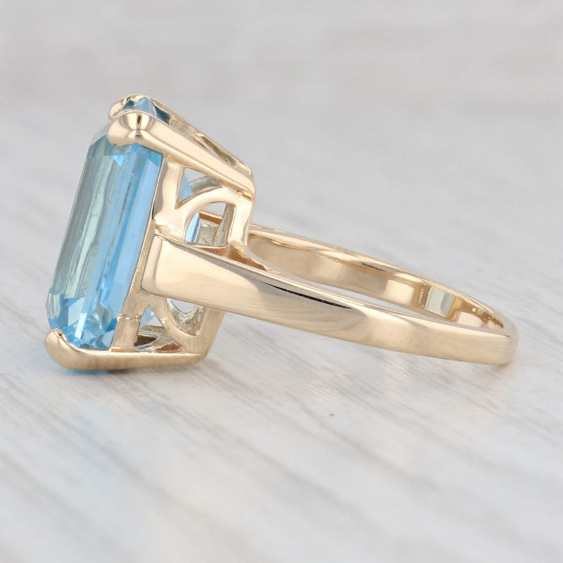 Light Gray 13ct Emerald Cut Blue Topaz Solitaire Ring 14k Yellow Gold Size 7.25