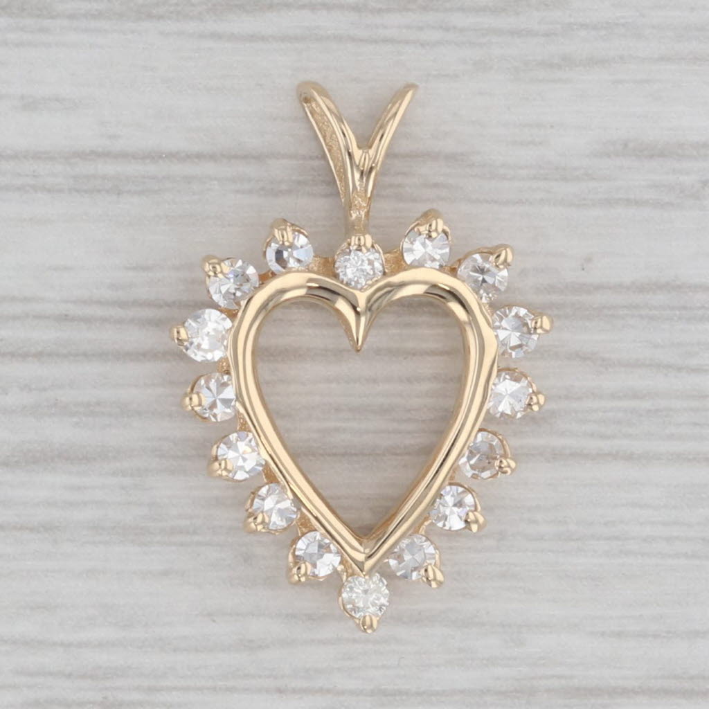 Gray 0.36ctw Diamond Halo Open Heart Pendant 14k Yellow Gold