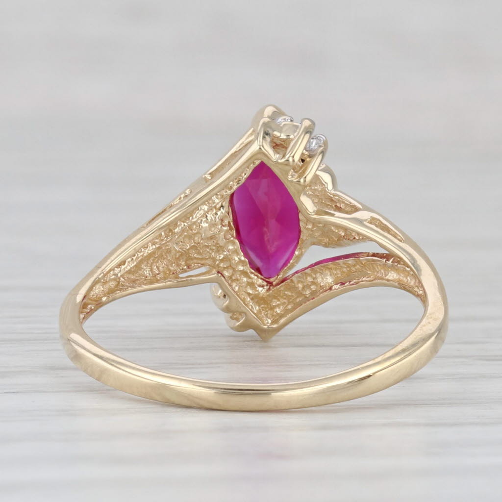 Light Gray 1.48ct Lab Created Ruby Ring 10k Yellow Gold Size 8.25 Bypass