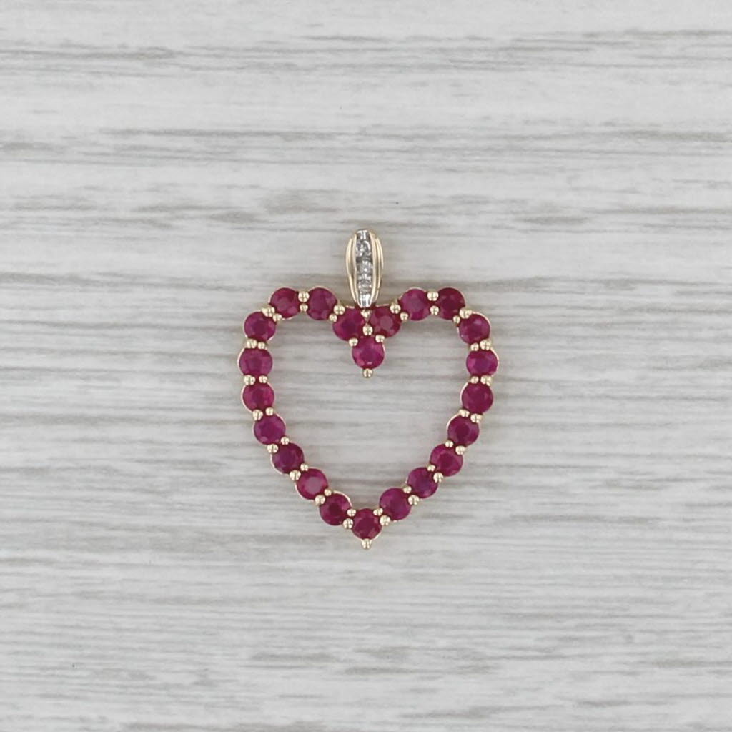 1.65ctw Ruby Diamond Open Heart Pendant 14k Yellow Gold
