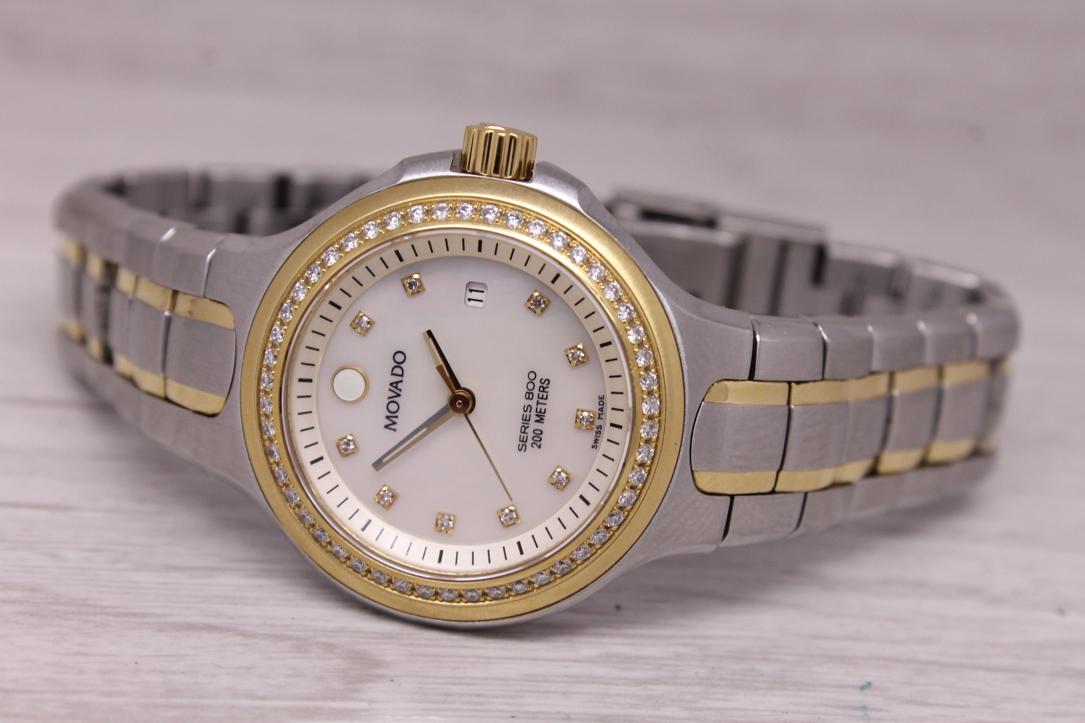 Movado Ladies Series 800 Diamond Bezel MOP 30mm Watch Two-Tone Steel Quartz Date