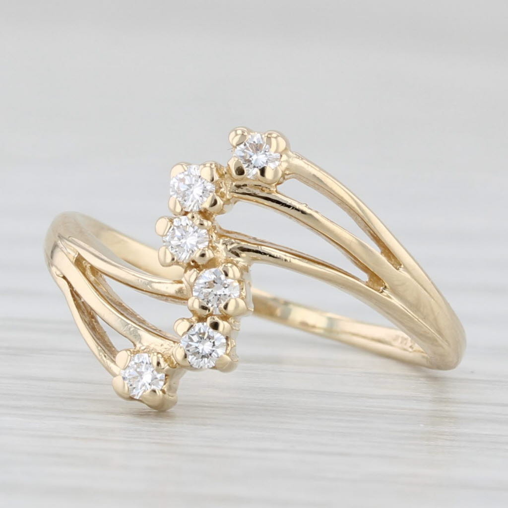 Light Gray 0.12ctw Diamond Bypass Ring 14k Yellow Gold Size 3.5