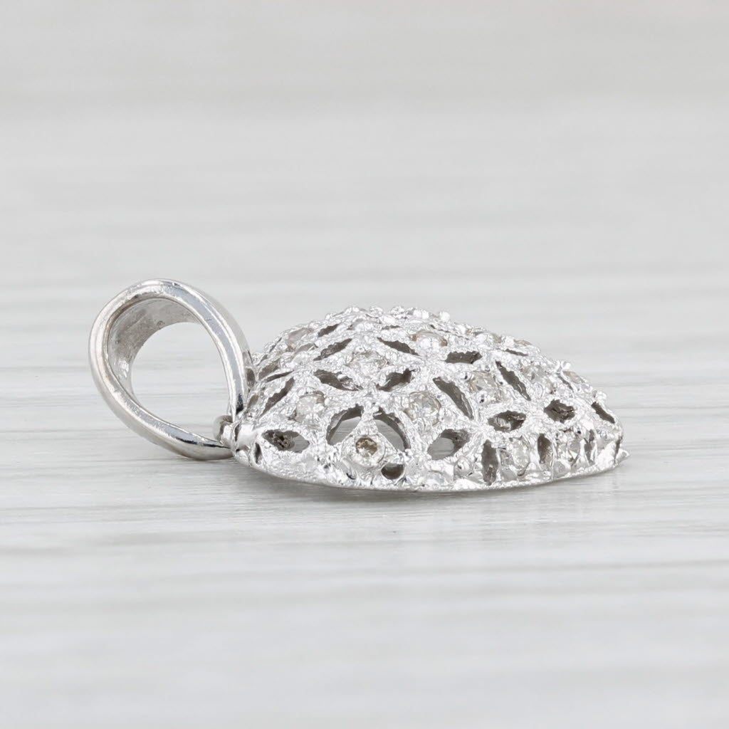 Light Gray 0.15ctw Diamond Openwork Heart Pendant 14k White Gold