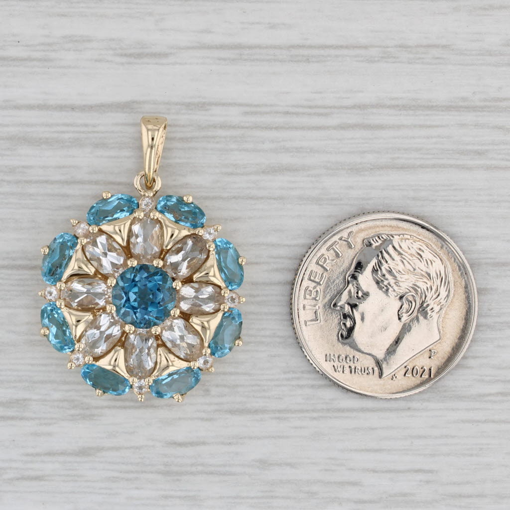 Gray 6ctw Blue White Topaz Flower Pendant 14k Yellow Gold