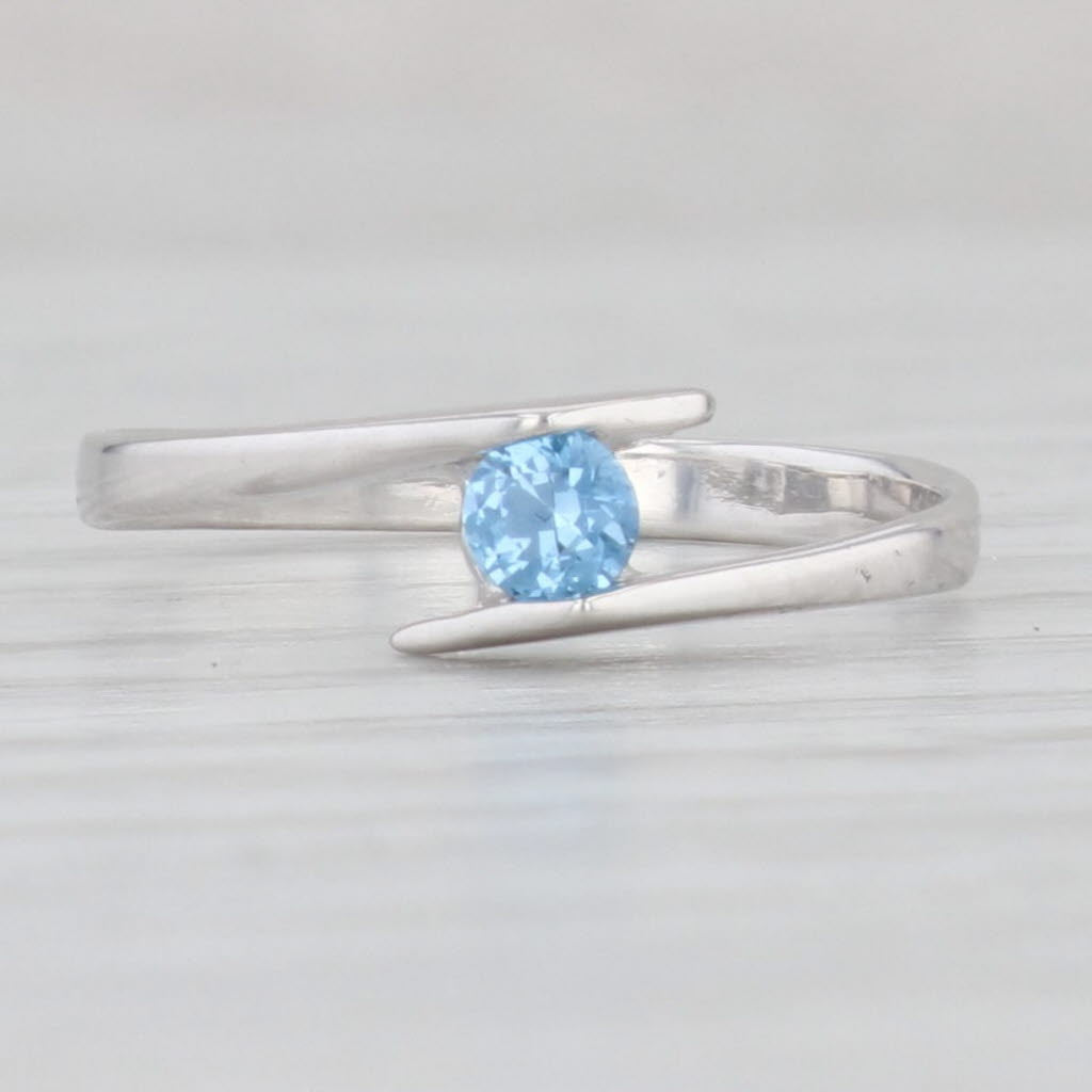 Light Gray 0.19ct Blue Lab Created Spinel Bypass Ring 14k White Gold Size 6 Round Solitaire