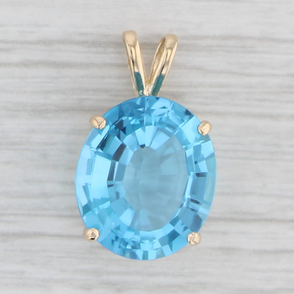 Light Gray 7.60ct Blue Topaz Pendant 14k Yellow Gold Oval Solitaire Drop