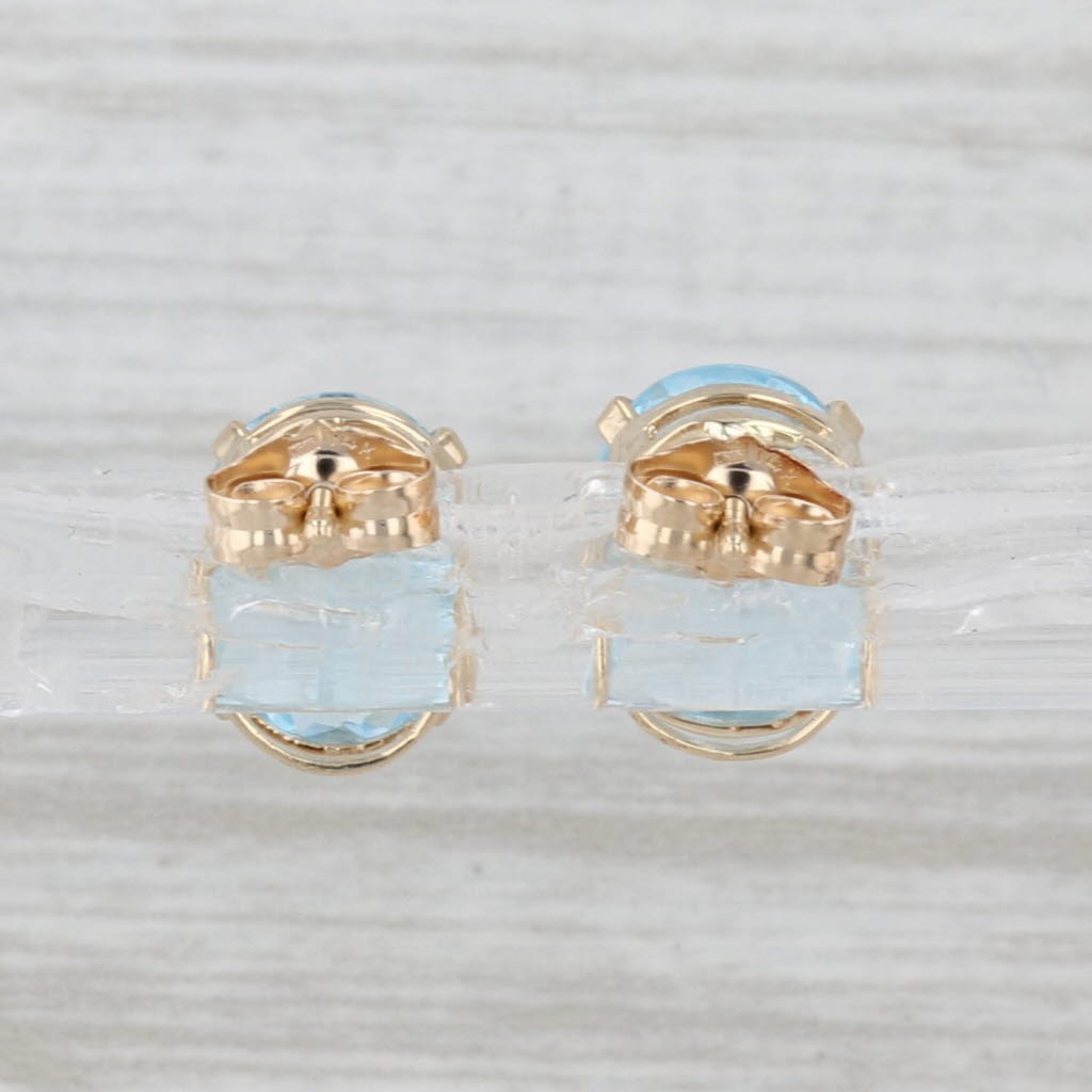 4.30ctw Oval Blue Topaz Stud Earrings 14k Yellow Gold Solitaire Studs