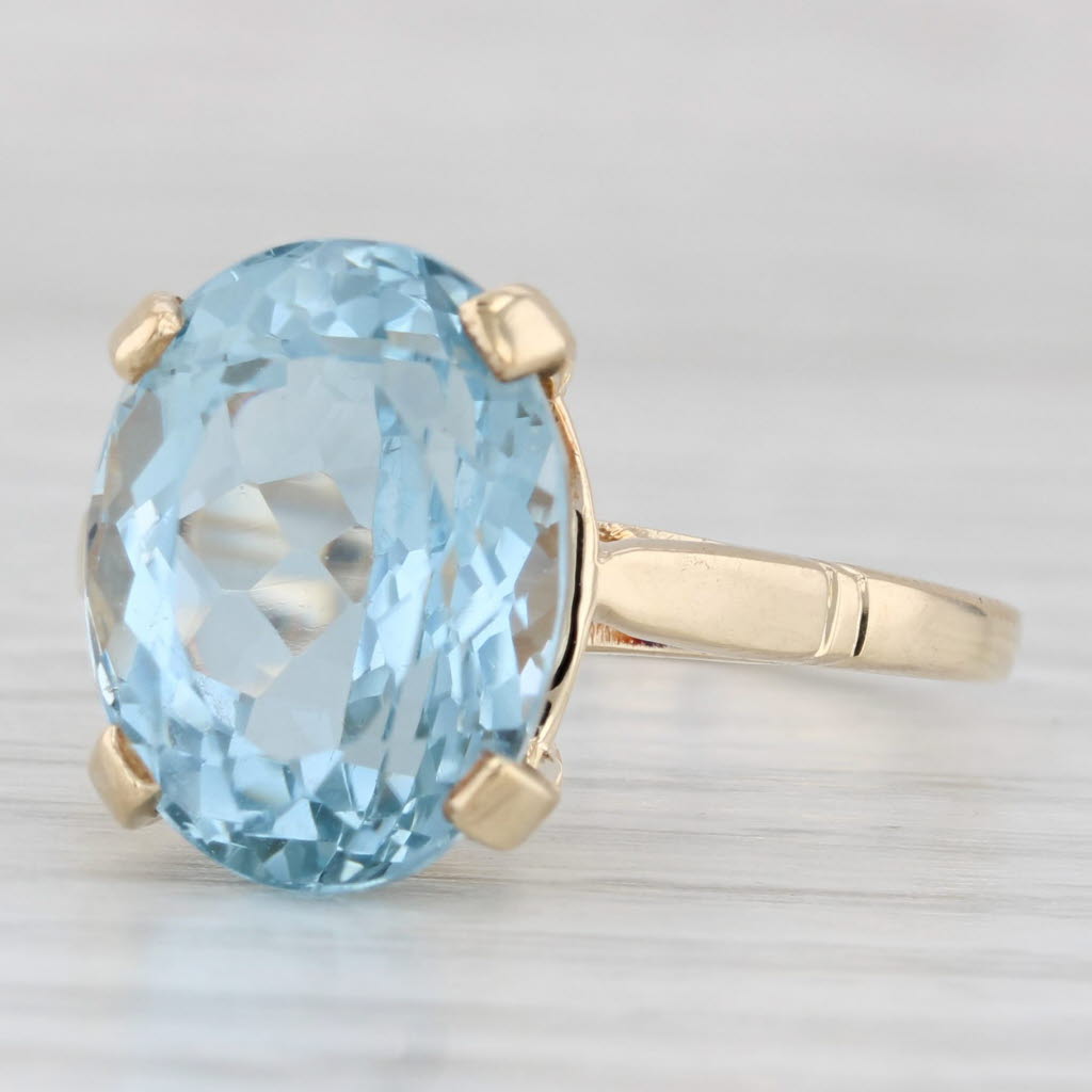 Light Gray 11.60ctw Oval Blue Topaz Solitaire Ring 10k Yellow Gold Size 9.5