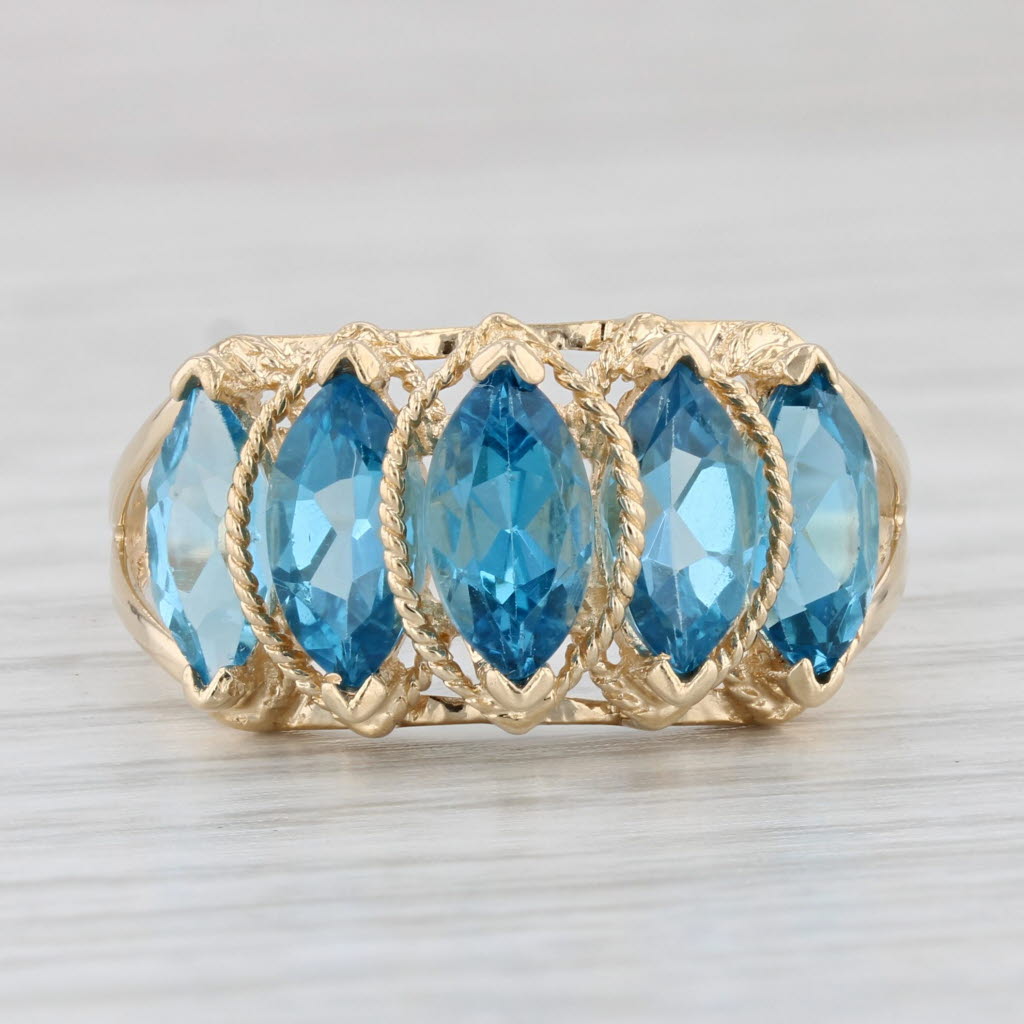 Light Gray 3.90ctw Tiered Marquise Blue Topaz Ring 14k Yellow Gold Size 10.5