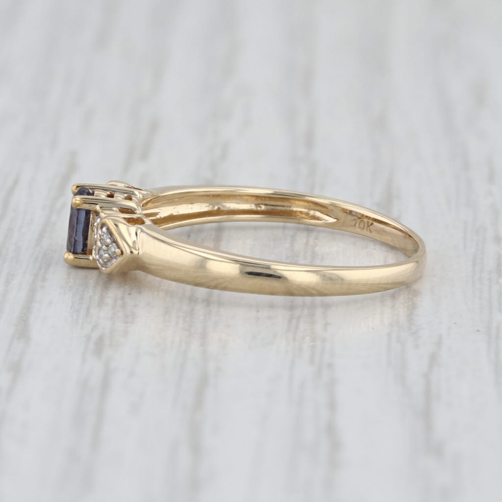 0.45ctw Color Change Garnet Diamond Ring 10k Yellow Gold Heart Accents