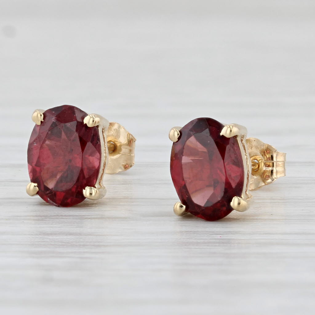 Light Gray 2.40ctw Rhodolite Garnet Stud Earrings 14k Yellow Gold Oval Solitaires