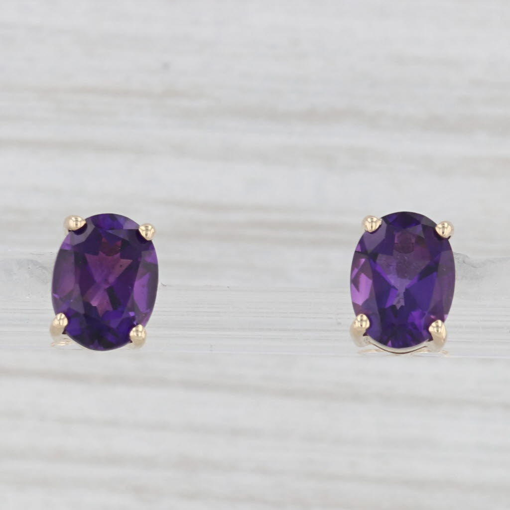 Light Gray 2.20ctw Oval Solitaire Amethyst Stud Earrings 14k Yellow Gold