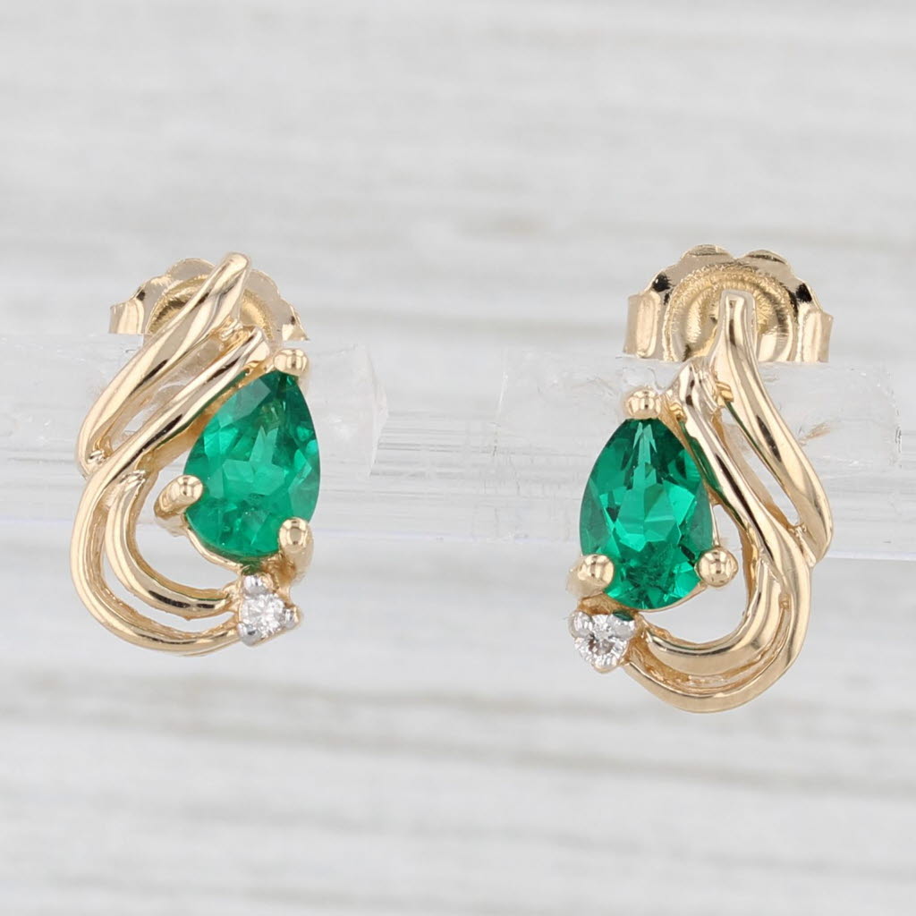 Light Gray 0.72ctw Lab Created Emerald Diamond Teardrop Stud Earrings 14k Yellow Gold